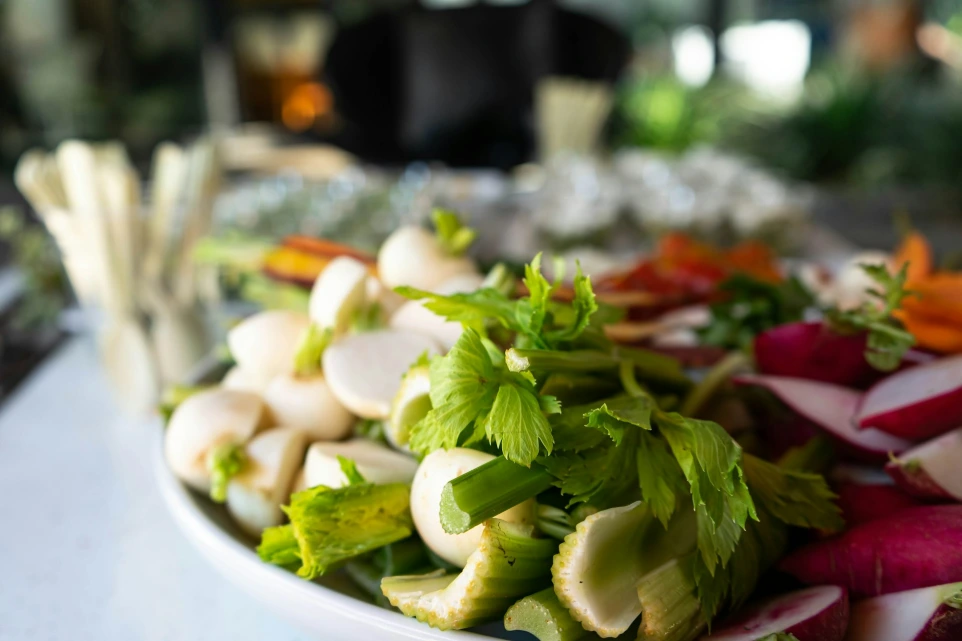 sliced green vegetable on white ceramic plate